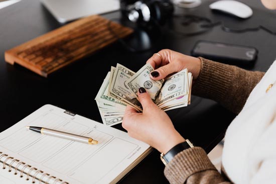 person counting cash