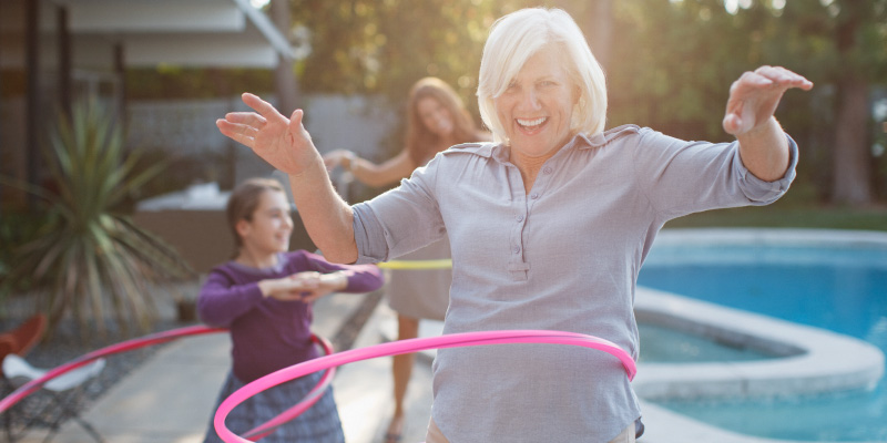 woman having fun outside with family