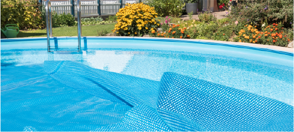 close up of above ground pool in backyard